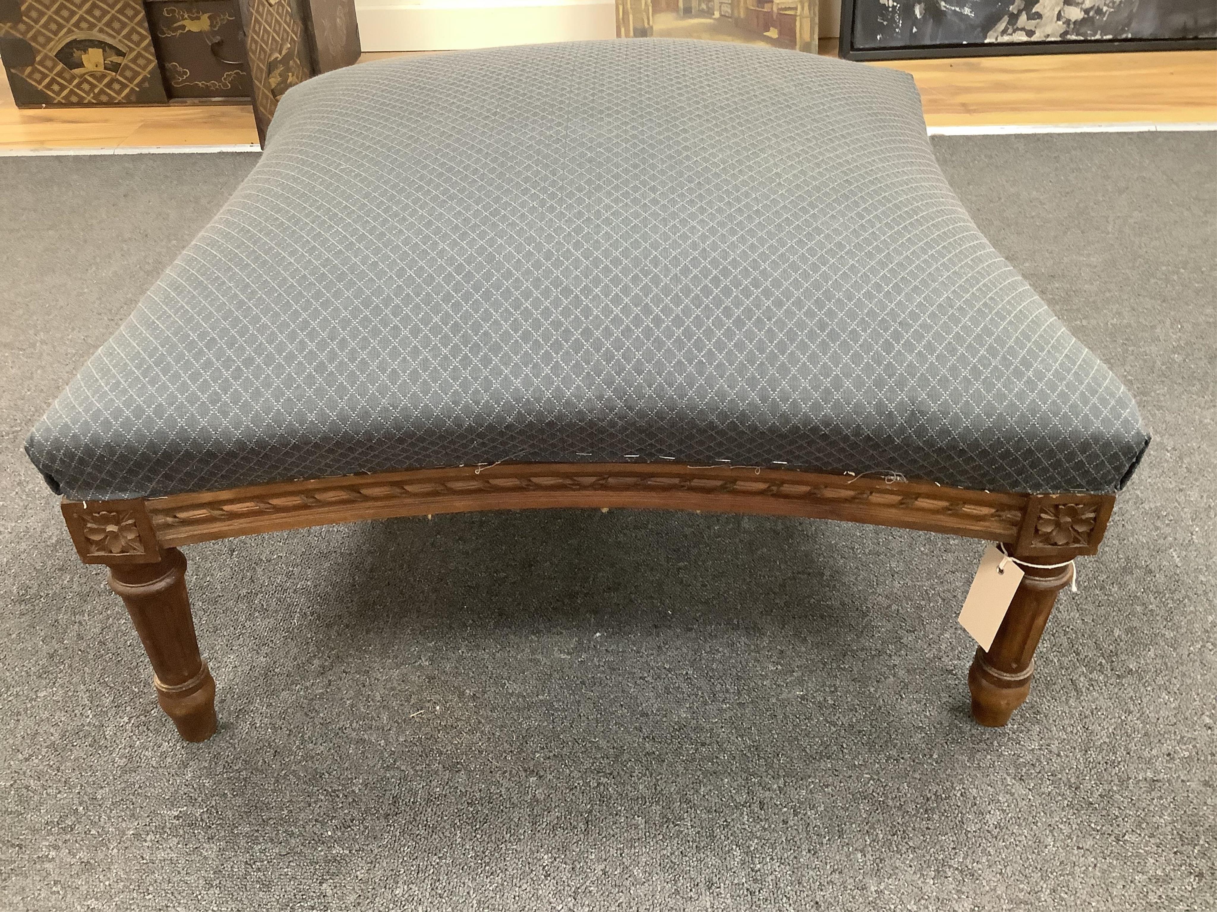 A French Louis XVI style upholstered stool, width 69cm, height 37cm. Condition - fair